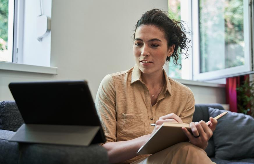 Woman reading at computer