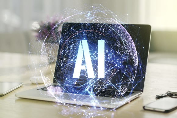 The letters AI over screen of laptop