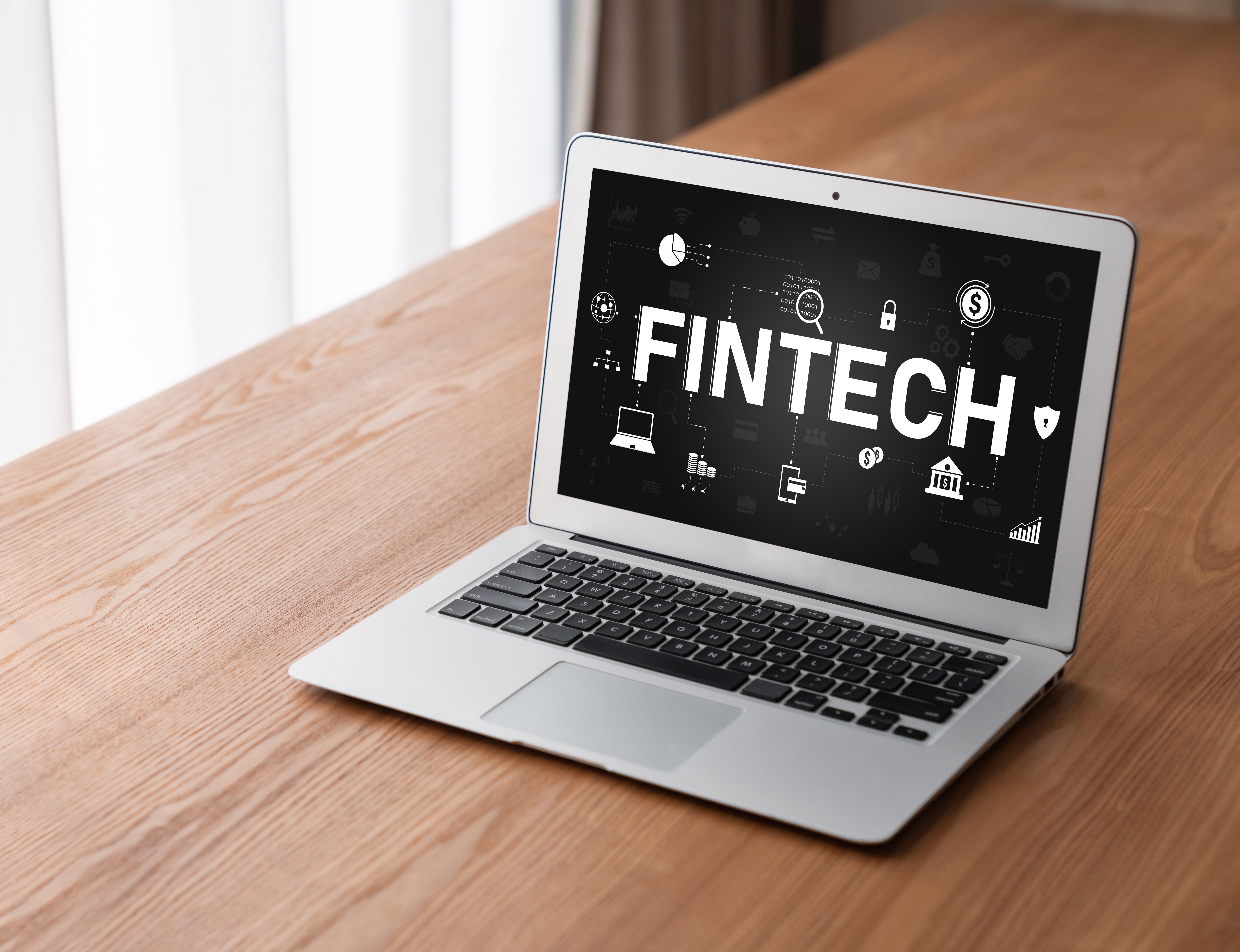 the word fintech on a laptop screen