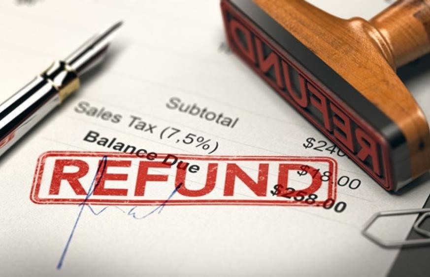 a stamp with the word 'refund'
