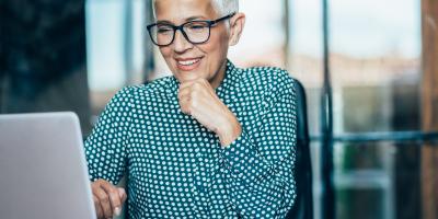 Woman looking at her computer