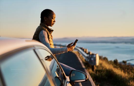 woman making payments on her phone Direct Deposit