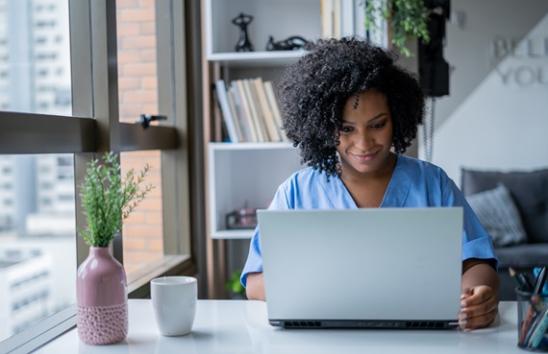 nurse at laptop