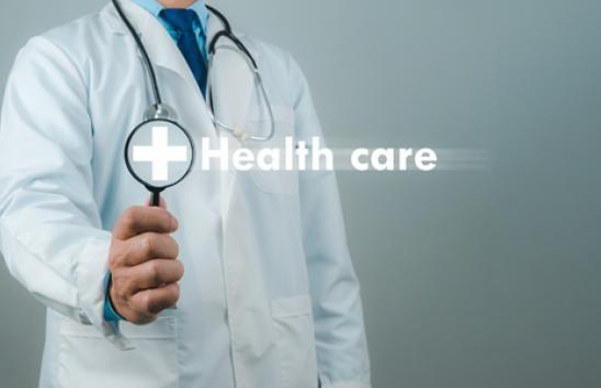 the words health care with a doctor's picture