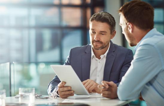Cropped shot of two businessmen meeting in the office