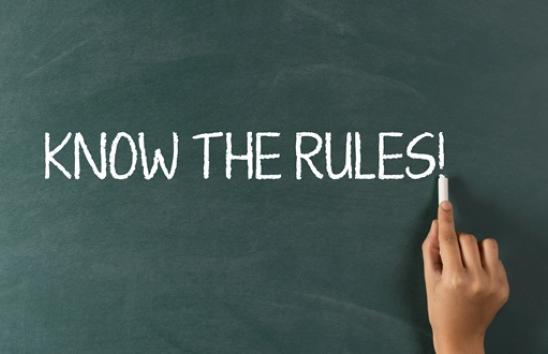 The words "know the rules" on a blackboard